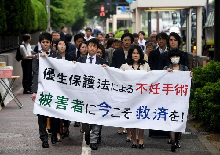 Lawyers and supporters of sterilized victims in Japan, seen protesting for compensation in 2018.