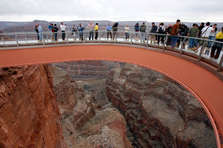 People walk along the Grand Canyon Skywalk on the Hualapai Indian Reservation in northwestern Arizona.