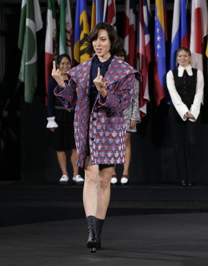 Plaza doing her favorite gesture while walking the runway during New York Fashion Week in 2016.