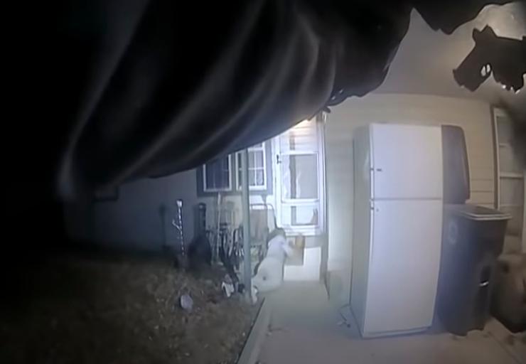 This image from police body camera footage shows officers approaching Quadry Sanders after they shot him on Dec. 5, 2021. 