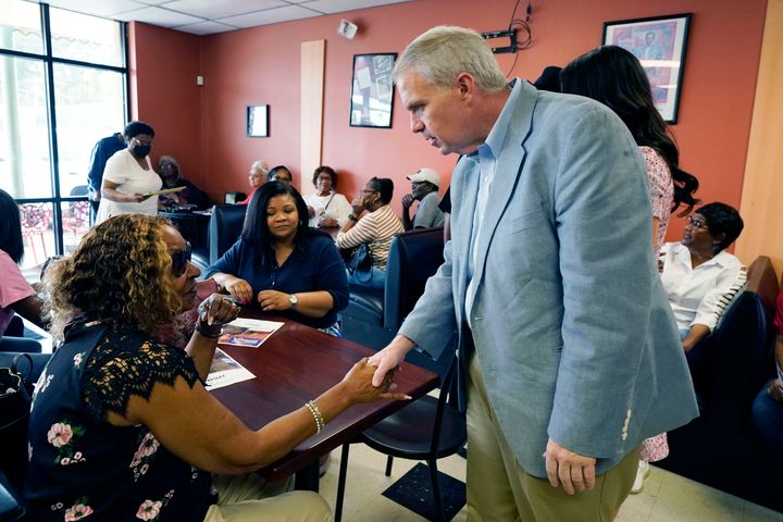 Democrat Brandon Presley meets with supporters in Grenada, Mississippi, in April. Presley has said he would not seek to change Mississippi's abortion ban.