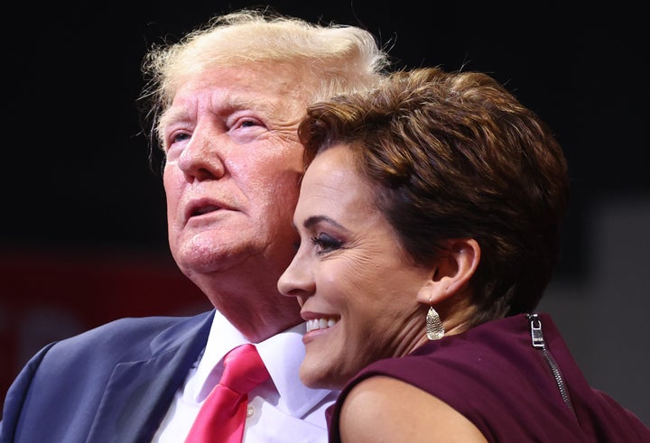 Former President Donald Trump with then-candidate for governor Kari Lake at a "Save America" rally in July 2022.