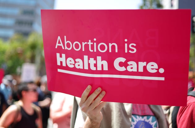 Protestors demonstrate at the March for Reproductive Rights organized by Women’s March L.A. on April 15, 2023, in Los Angeles, California.