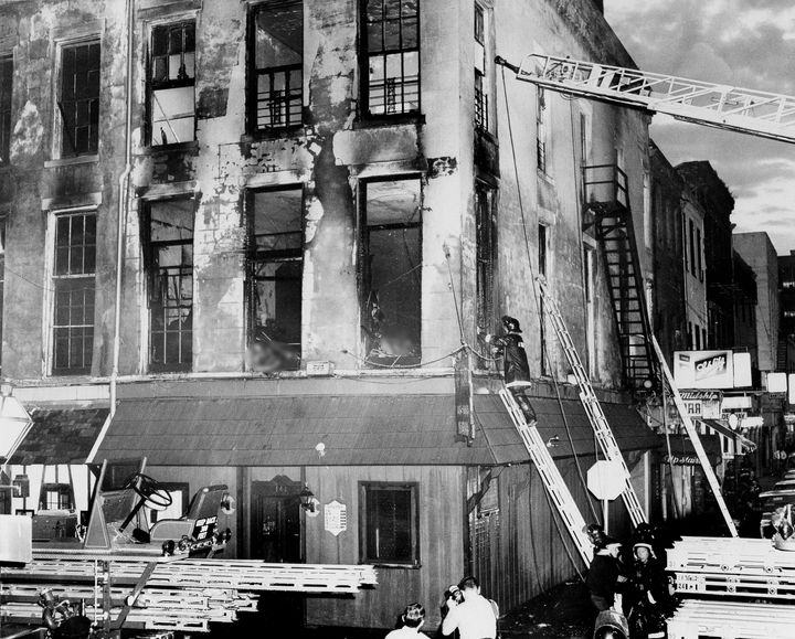 The building that housed the UpStairs Lounge, where 32 people were killed in a fire. (This image has been edited to obscure several bodies.)