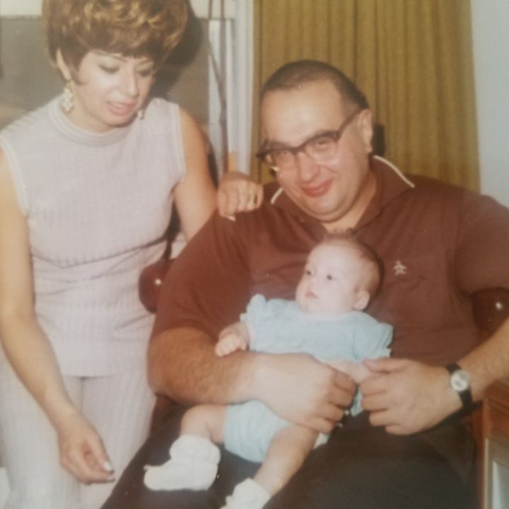 The author as an infant with her adoptive parents.