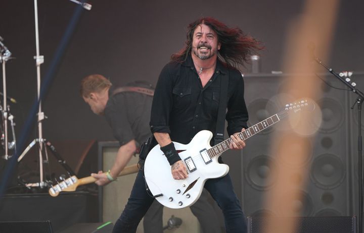 The Foo Fighters, performing under the name 'The ChurnUps', on the Pyramid stage at the Glastonbury Festival at Worthy Farm in Somerset. 