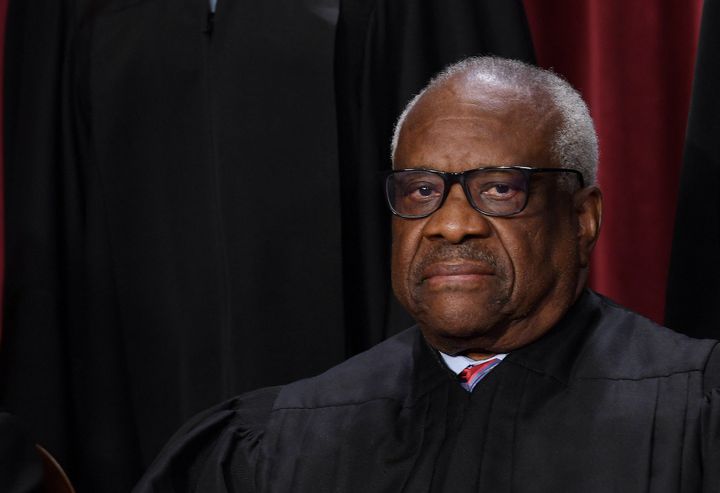 Associate Supreme Court Justice Clarence Thomas poses for the official photo at the Supreme Court in Washington, D.C., on Oct. 7, 2022. 