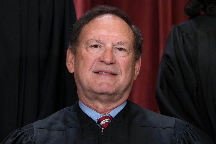 FILE - Associate Justice Samuel Alito joins other members of the Supreme Court as they pose for a new group portrait, at the Supreme Court building in Washington, Friday, Oct. 7, 2022. Alito writing in the Supreme Court's opinion,"Roe was egregiously wrong from the start," that overturned Roe v. Wade made the top three of a Yale Law School librarian's list of the most notable quotations of 2022. ((AP Photo/J. Scott Applewhite, File)