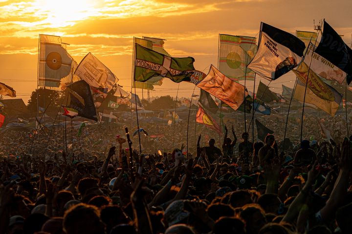Keen festival-goers often bring their own personalised flags to Glastonbury