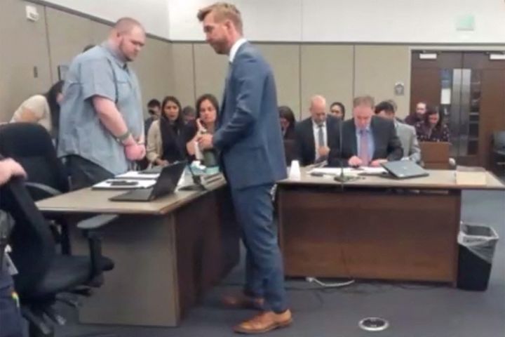 Anderson Lee Aldrich takes a seat after pleading guilty to murder and other crimes in a still image from courtroom Webex video on June 26, 2023.