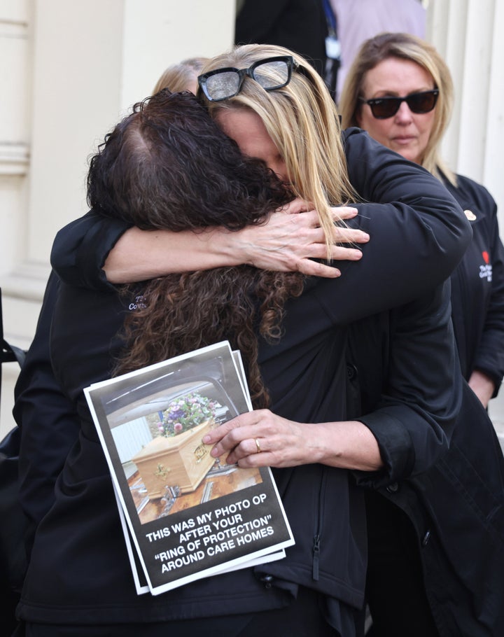 Lorelei King (centre), whose husband died during the pandemic protests as former health secretary Matt Hancock arrives to give evidence to the UK Covid-19 Inquiry.