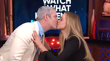 Jennifer Lawrence Gives Andy Cohen A Kiss And It’s So Awkward