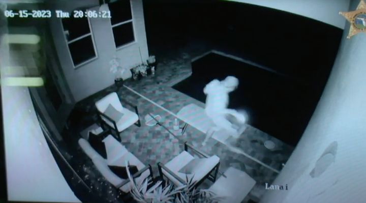 Pool cleaner Karl Polek, 33, is seen fleeing from a Florida home after the homeowner fired an AR-15 style rifle at him.