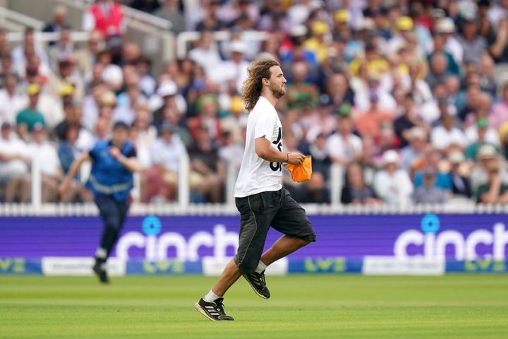 A Just Stop Oil protester on the field during day one of the second Ashes test match at Lord's, London.