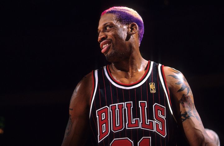 Dennis Rodman with multi-colored hair at Madison Square Garden in New York City in 1997 (Photo by Manny Millan /Sports Illustrated via Getty Images)