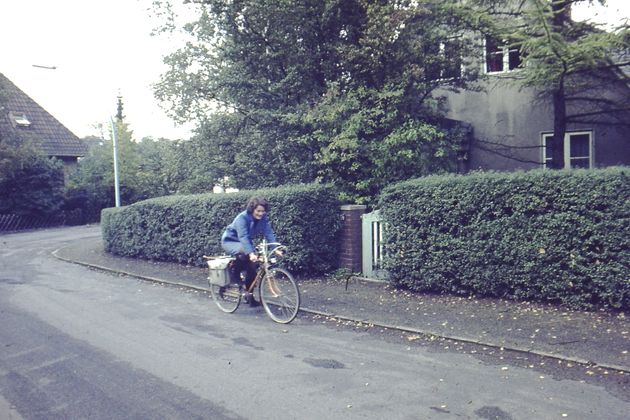 Pam rides her bicycle in Hamburg, Germany, in the early '70s.