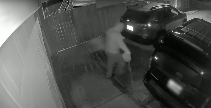 Surveillance video shows a man believed to be David Crawford setting cars on fire on March 16, 2019, in Prince George's County, Maryland.