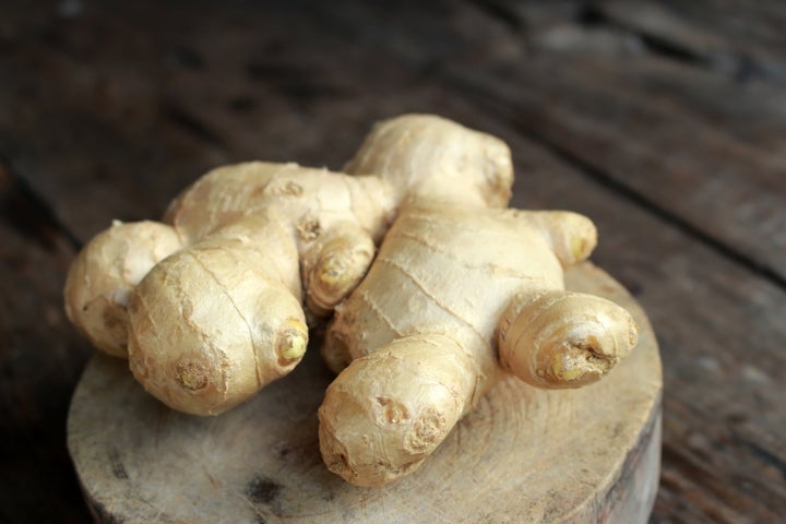 Ginger on wooden background