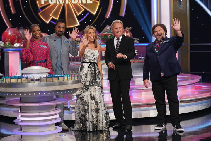 Sasheer Zamata, Jack Black and Kal Penn on a holiday episode of "Celebrity Wheel of Fortune" with Pat Sajak and Vanna White.