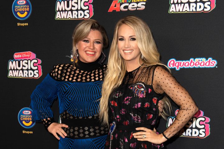 Kelly Clarkson and Carrie Underwood attend the 2018 Radio Disney Music Awards on June 12, 2018 in Hollywood.