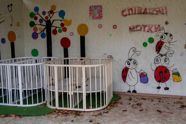 Empty cribs at a playhouse in the courtyard of Kherson regional children's home in Kherson, southern Ukraine, Friday, Nov. 25, 2022.