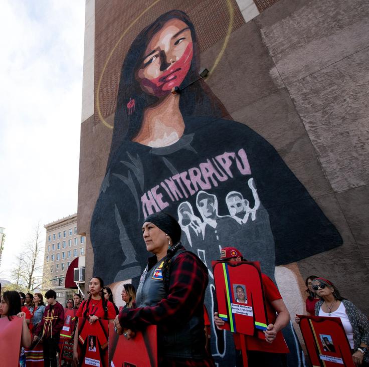 People gather next to a mural by an Indigenous artist for a rally on Missing or Murdered Indigenous Persons Awareness Day in Colorado Springs, Colorado, on May 5.