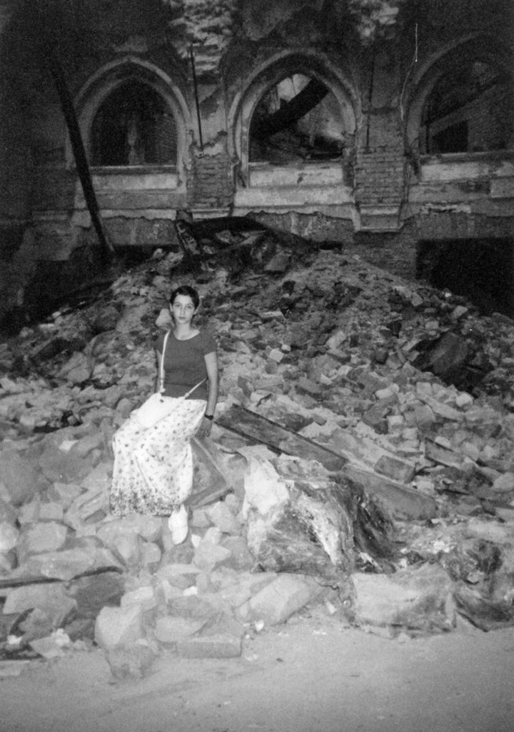 The author at 17 amid the rubble of the National Library in Sarajevo.