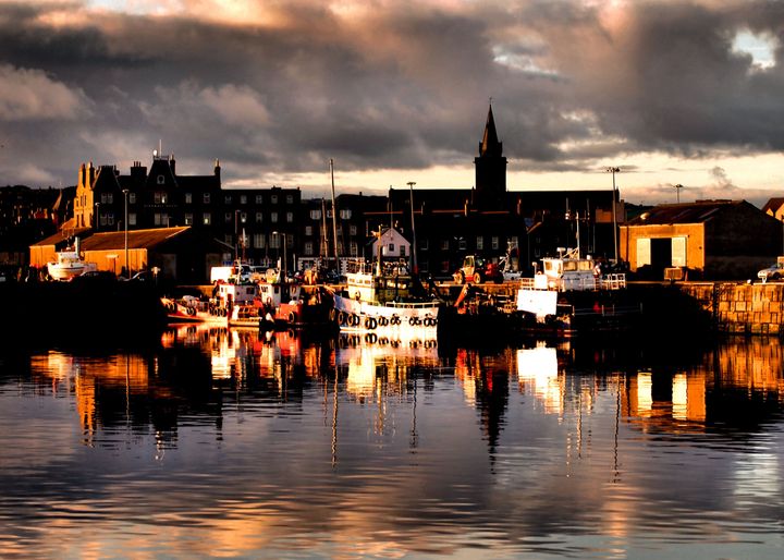 The historic town of Kirkwall, capital of the Scottish Orkney Islands, seen in the early morning from its harbour.