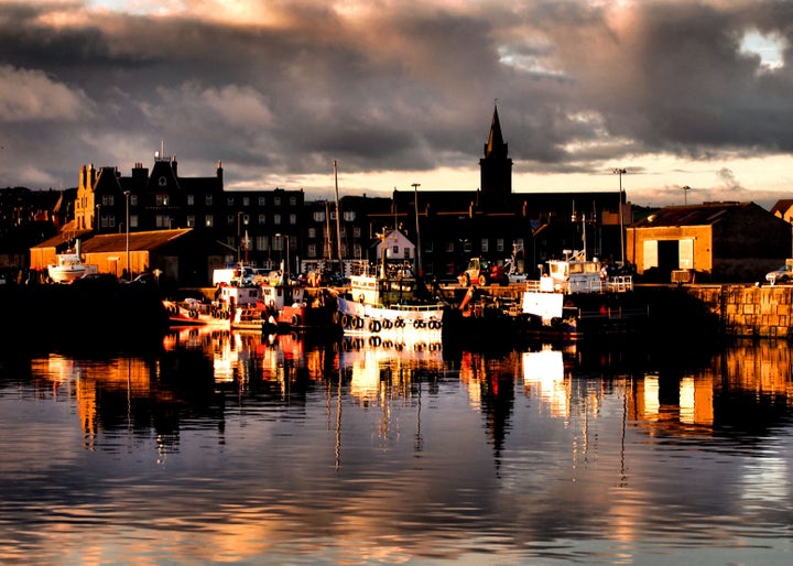 The historic town of Kirkwall, capital of the Scottish Orkney Islands, seen in the early morning from its harbour.