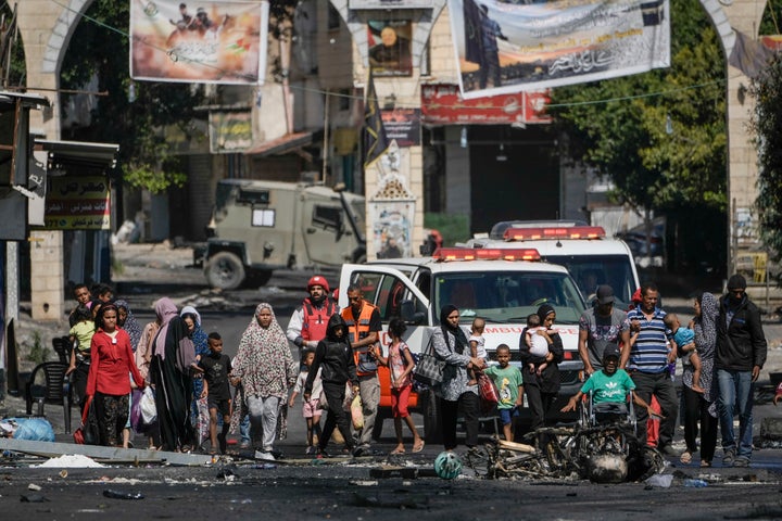 Residents of the Jenin refugee camp fled their homes as the Israeli military pressed ahead with an operation in the area on July 4, 2023. Palestinian health officials put the Palestinian death toll from the two-day raid at 10.
