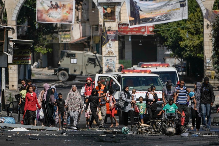 Residents of the Jenin refugee camp fled their homes as the Israeli military pressed ahead with an operation in the area on July 4, 2023. Palestinian health officials put the Palestinian death toll from the two-day raid at 10. 