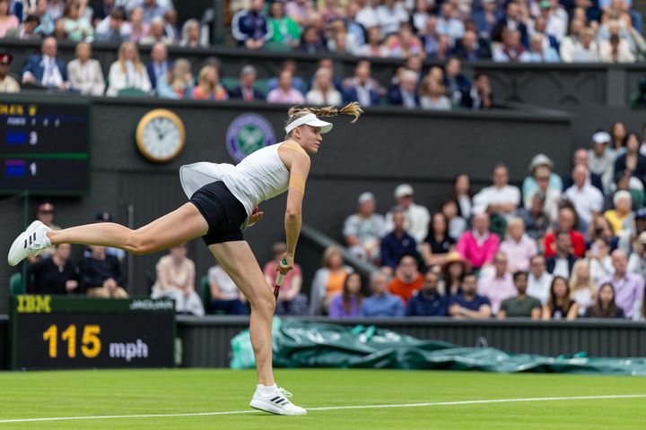  Elena Rybakina of Kazakhstan serving against the US's Shelby Rogers in the Ladies' Singles first round match for Wimbledon on Tuesday – wearing black shorts.