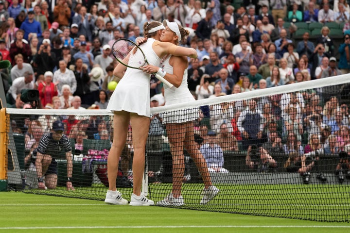 Rybakina and Rogers' decision to wear black shorts was subtle underneath their white outfits 