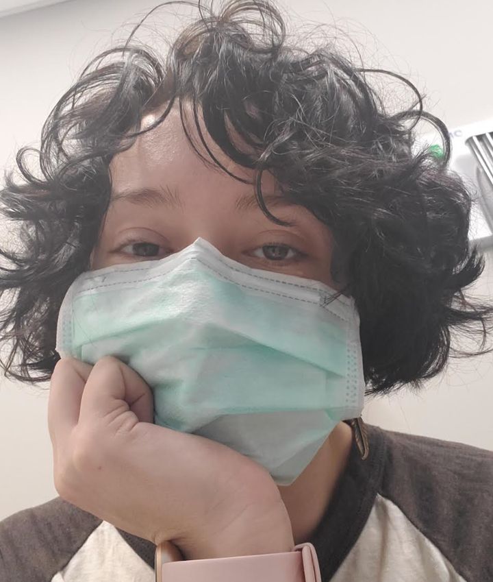 "This is the type of mask we were given to wear during the pandemic," the author writes. "We were asked to use them five times before we could receive a new one."