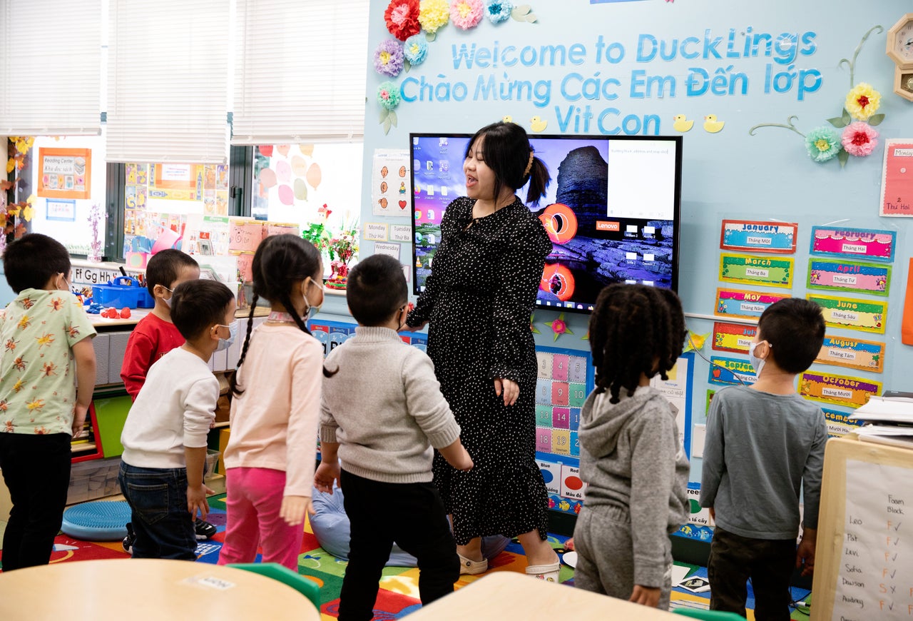 Teacher Nguyen Ha leads a class at the Âu Cơ Preschool program, which operates inside a Vietnamese community center in Boston.