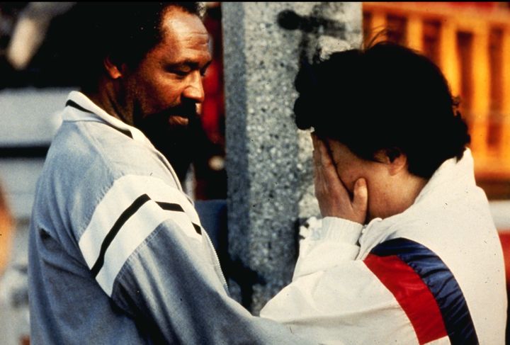 With her new documentary, Um hopes to reframe the conversation around the relationship between Korean and Black Americans. Pictured: A local resident comforts a Korean American store owner after she returns to find her business looted and burned in South Central Los Angeles on April 30, 1992, during day two of the Los Angeles uprising.