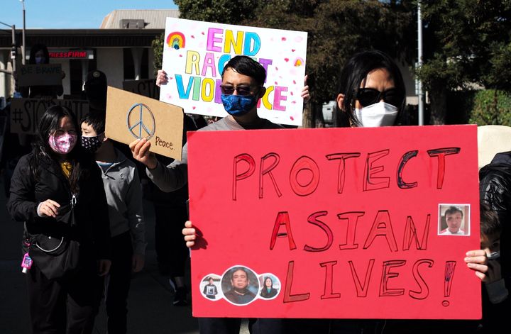 People take part in a rally against anti-Asian hate crimes in San Mateo, California, on Feb. 27, 2021.