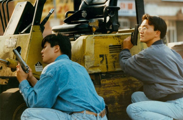 “So much of our immigrant parents come to America with this mindset of, ‘I’m going to assimilate. I’m going to be American,’" Um said. "And what is more American than being anti-Black?”Pictured: Korean American storeowners defend their property as gunfire breaks out in Koreatown on April 30, 1992, in Los Angeles.