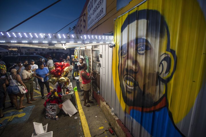 “If there’s no new stores popping up, how do people access food?” Um asked. “How do people access community?" Pictured: Protesters gather in front of a mural painted on the wall of the convenience store where Alton Sterling was shot and killed, July 6, 2016, in Baton Rouge, Louisiana.