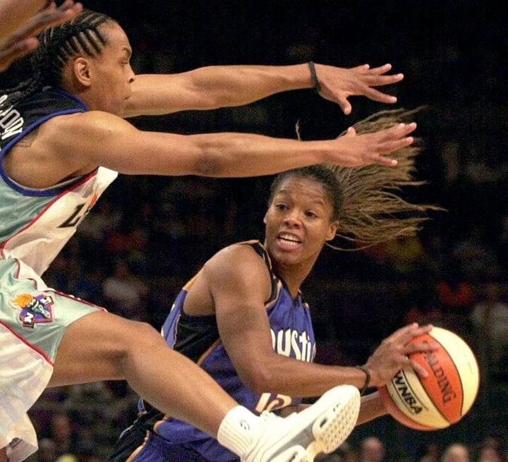 Washington Mystics' Nikki McCray, right, is defended by New York Liberty's Teresa Weatherspoon during the first half Saturday, June 16, 2001 in New York. Two-time Olympic gold medalist and former ABL MVP Nikki McCray-Penson has died. She was 51. McCray-Penson was an assistant women's basketball coach at Rutgers last season and the school confirmed her death, although the cause of her passing was not immediately known. (AP Photo/Mark Lennihan, File)