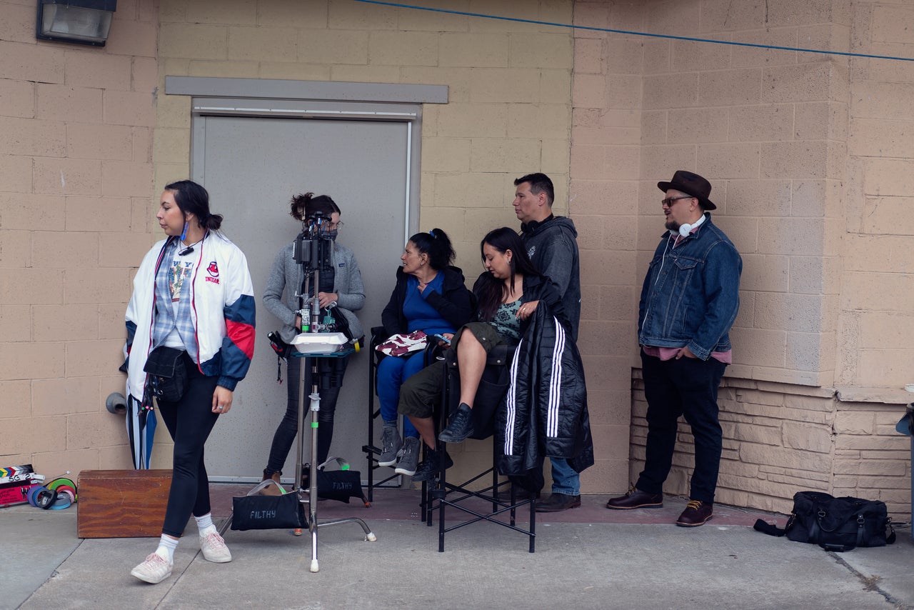 The production team during a brief break before the cameras roll. Chavez is joined by Pensoneau and Harjo (right).