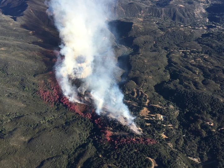 FILE - This photo provided by Los Padres Forest Aviation and KEYT-TV shows a wildfire burning in Los Padres National Forest, north of Santa Barbara, on Wednesday, June 15, 2016, in Goleta, Calif.