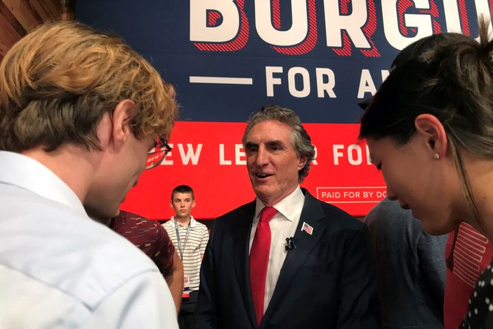 North Dakota Gov. Doug Burgum talks with supporters in Fargo after announcing his bid for the Republican nomination for president on June 7, 2023.