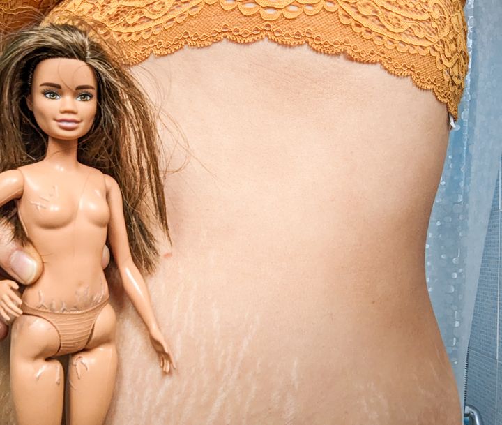 Kate Claxton painted stretch marks on her daughter's Barbie to represent different types of bodies.