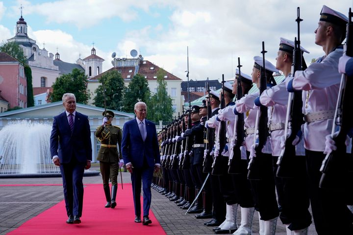 Lithuania's President Gitanas Nauseda, left, welcomes U.S. President Joe Biden at the Presidential Palace prior the NATO summit in Vilnius, Lithuania, Tuesday, July 11, 2023. Russia's war on Ukraine will top the agenda when NATO leaders meet in the Lithuanian capital Vilnius on Tuesday and Wednesday. (AP Photo/Susan Walsh)