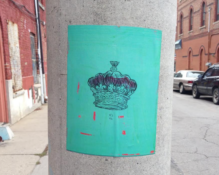 The crown poster that Joe plastered all over the author's neighborhood. "Potential evidence for Joe's arrest," she writes.