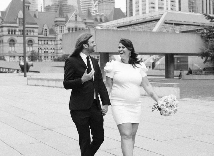 The author and Joe leaving their city hall wedding. "This was three months before our daughter was born," she writes.