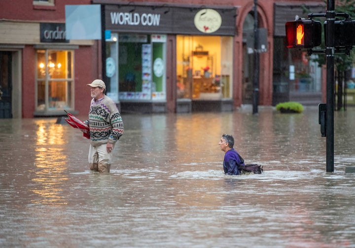 The Quirky Pet owner Cindra Conison, right, and her husband Richard Sheir leave their shop on Monday night, July 10, 2023, in downtown Montpelier, Vermont.