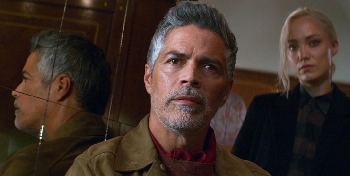 Esai Morales (left), pictured here with Pom Klementieff's Paris, plays a nefarious man from Ethan's past who proves to be his match in every way.