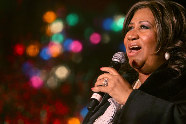 In this Dec. 4, 2008 file photo, Aretha Franklin performs during the 85th annual Christmas tree lighting at the New York Stock Exchange in New York. 
